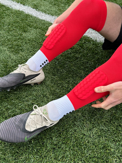 Red all in 1 grip sock on athlete 